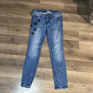 Cat and jack jeans have stars on the side